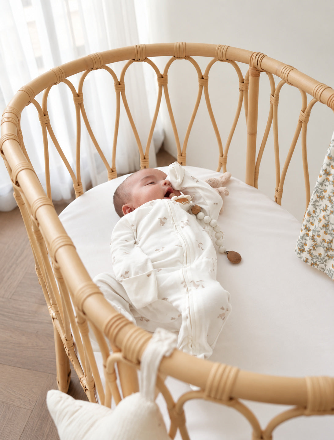 Wavy Rattan Bassinet